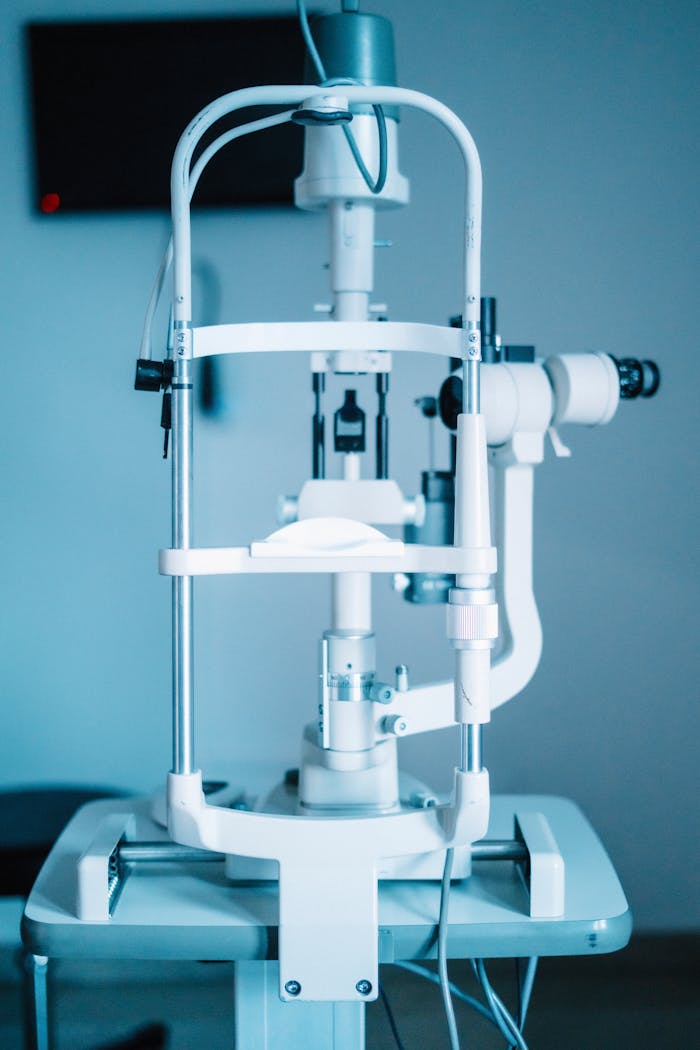 gallery-3 Detailed view of a digital slit lamp in a professional eye clinic setting, emphasizing clinical technology.