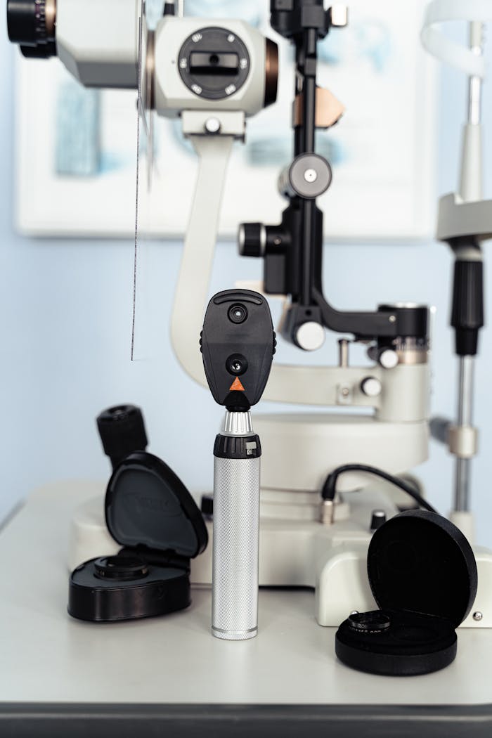gallery-1 Close-up of ophthalmic equipment for eye exams in a clinical setting.